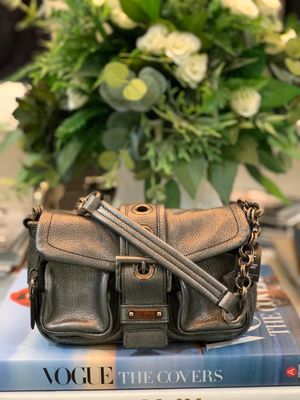 green prada mini bolsa