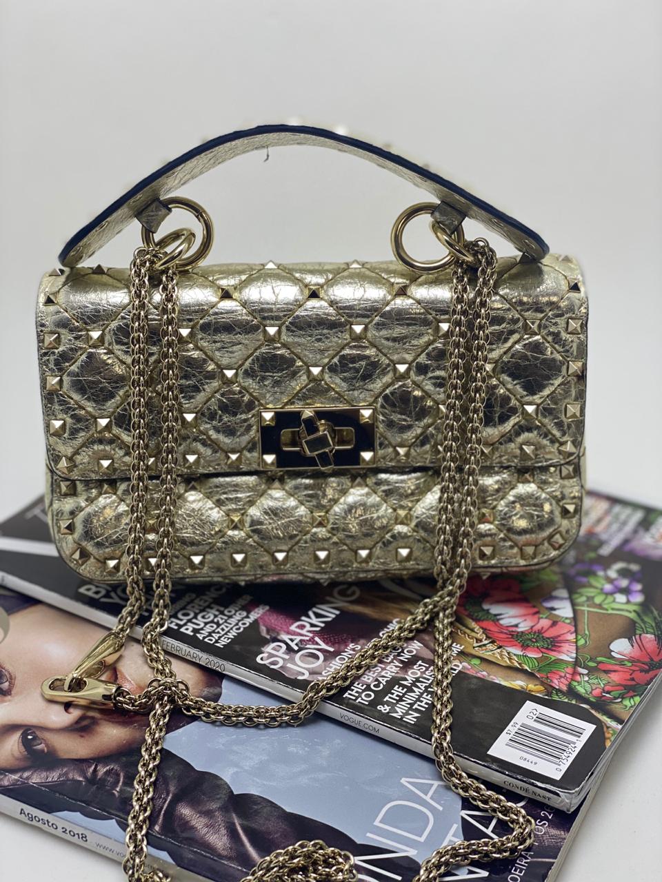 bolsa valentino dourada