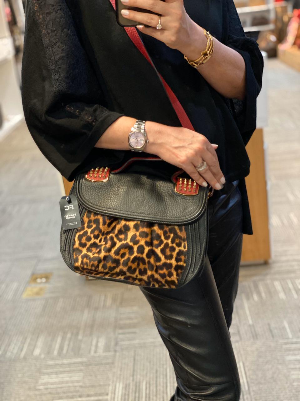 louboutin dust bolsa