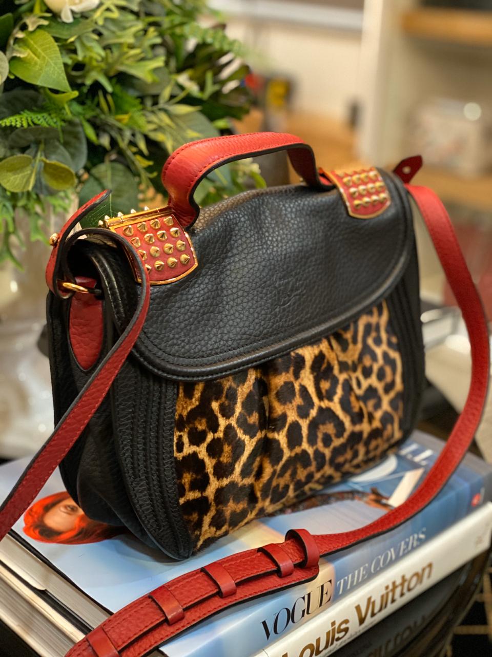 louboutin dust bolsa