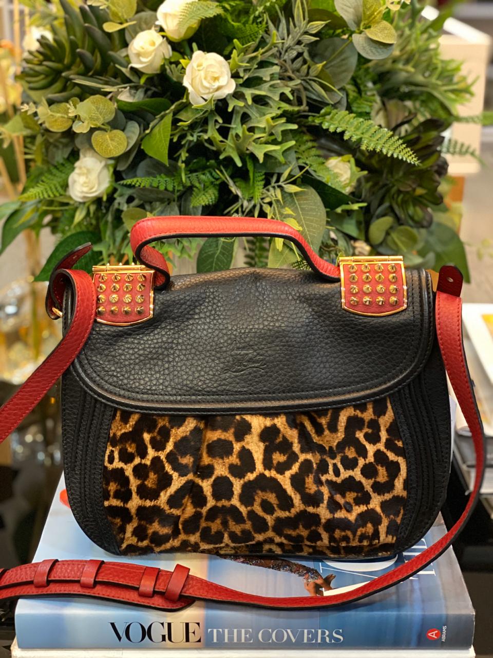 louboutin dust bolsa